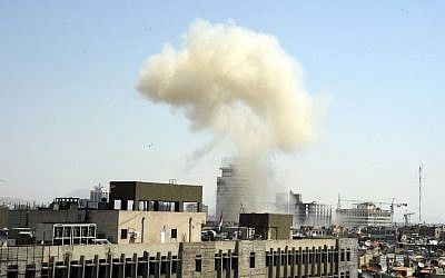 Smoke billows from a powerful explosion in the central Marjeh district of Damascus, Syria, on Tuesday, April. 30, 2013. (photo credit: AP Photo/SANA)