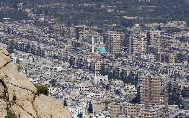 This photo, taken in 2012, shows a general view of Damascus. (photo credit: AP Photo/Muzaffar Salman, File) This photo, taken in 2012, shows a general view of Damascus. (photo credit: AP Photo/Muzaffar Salman, File)