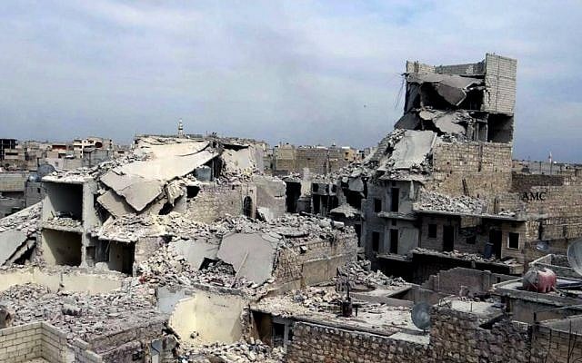 Destroyed homes in a government airstrike and shelling, in the neighborhood of Marjeh in the northern city of Aleppo, Syria, Thursday, April 11, 2013. (photo credit: AP/Aleppo Media Center)
