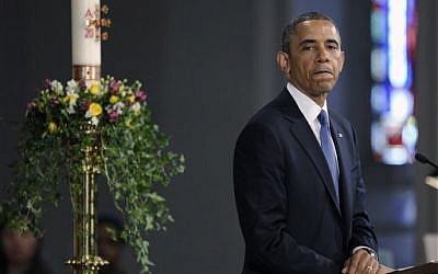 President Barack Obama pauses while speaking at the "Healing Our City: An Interfaith Service" at the Cathedral of the Holy Cross in Boston, Thursday, April 18, 2013 (AP Photo/Susan Walsh)