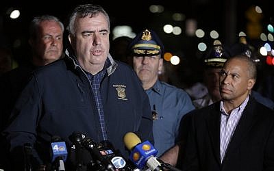 Boston police commissioner Ed Davis talks to reporters, Friday. (photo credit: AP/Matt Rourke)