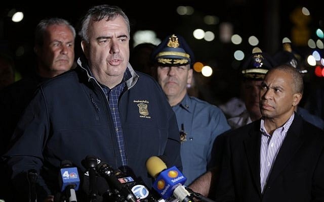 Boston police commissioner Ed Davis talks to reporters, Friday. (photo credit: AP/Matt Rourke)