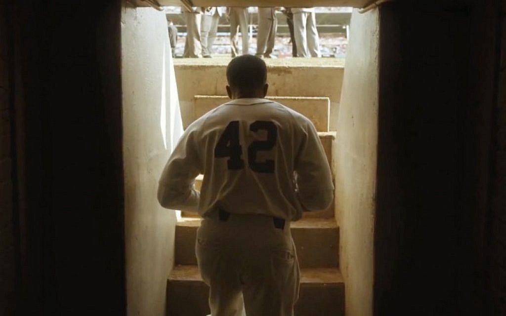 Chadwick Boseman playing Jackie Robinson getting ready to take the field in the new film '42.' (photo credit: Legendary Pictures/JTA) Chadwick Boseman playing Jackie Robinson getting ready to take the field in the new film '42.' (photo credit: Legendary Pictures/JTA)