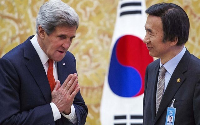 US Secretary of State John Kerry, left, gestures as he meets South Korea's Foreign Minister Yun Byung-se at the presidential Blue House in Seoul on Friday (photo credit: AP/Paul Richard) US Secretary of State John Kerry, left, gestures as he meets South Korea's Foreign Minister Yun Byung-se at the presidential Blue House in Seoul on Friday (photo credit: AP/Paul Richard)