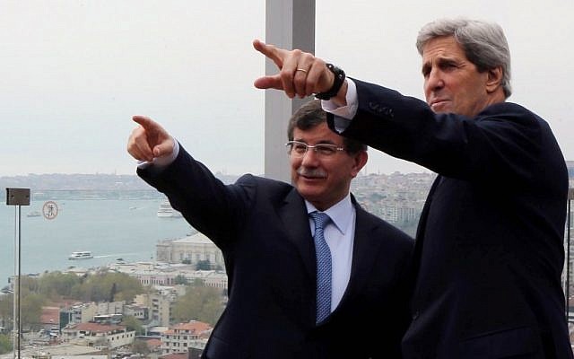 US Secretary of State John Kerry, right, and his Turkish counterpart, Ahmet Davutoglu, point toward the Bosporus in Istanbul, Turkey, Sunday, April 21, 2013. (photo credit: AP/Hakan Goktepe, Pool) US Secretary of State John Kerry, right, and his Turkish counterpart, Ahmet Davutoglu, point toward the Bosporus in Istanbul, Turkey, Sunday, April 21, 2013. (photo credit: AP/Hakan Goktepe, Pool)