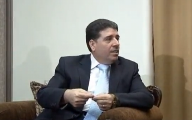 Syrian Prime Minister Wael al-Halqi in 2012. (photo credit: image capture from YouTube video uploaded by euronewses)