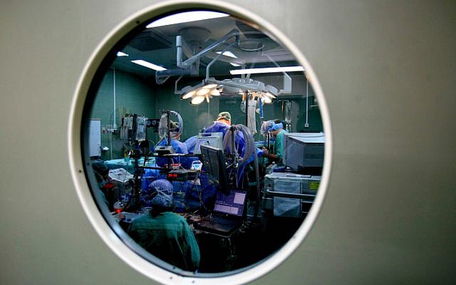 Surgeons and nurses performing surgery in an Israeli hospital on January 15. 2007. (photo credit: Nati Shohat /Flash90) Surgeons and nurses performing surgery in an Israeli hospital on January 15. 2007. (photo credit: Nati Shohat /Flash90)
