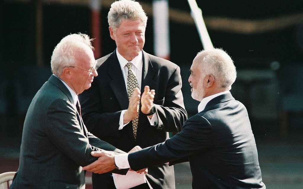 US President Bill Clinton, Israeli Prime Minister Yitzhak Rabin, King Hussein of Jordan at the peace treaty signing ceremony in the Arava Desert, October 1994. (Nati Shohat/Flash90) US President Bill Clinton, Israeli Prime Minister Yitzhak Rabin, King Hussein of Jordan at the peace treaty signing ceremony in the Arava Desert, October 1994. (Nati Shohat/Flash90)