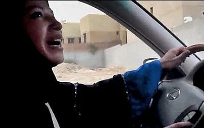 A Saudi Arabian woman drives a car as part of a campaign to defy Saudi Arabia's ban on women driving, June 17, 2011 (AP Photo)