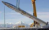 A ground-based missile interceptor being loaded into a silo in Alaska in 2007. (illustrative photo: Sgt. Jack W. Carlson III/Department of Defense)