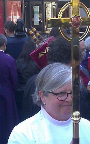 Meeting of crucific and Torah scroll at post-Boston Marathon attack faith service. (photo credit: Matt Lebovic/Times of Israel) Meeting of crucific and Torah scroll at post-Boston Marathon attack faith service. (photo credit: Matt Lebovic/Times of Israel)