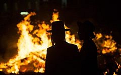 A Lag BaOmer bonfire in the Ultra orthodox neighborhood of Meah Shearim, Jerusalem, April 25, 2013 (photo credit: by Yonatan Sindel/Flash90)