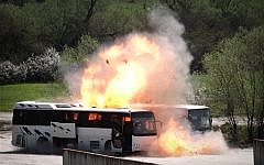 Bulgarian investigators stage a reenactment of the bus bombing in July 2012 that killed five Israeli tourists at the Burgas airport, on Friday, April 26, 2013. (photo credit: AP/Valentina Petrova)