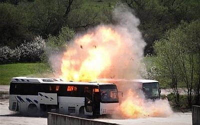 Bulgarian investigators stage a reenactment of the bus bombing in July 2012 that killed five Israeli tourists at the Burgas airport, on Friday, April 26, 2013. (photo credit: AP/Valentina Petrova)