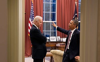 Barack Obama, right, speaking with Joe Biden in the Oval Office in March. (photo credit: Pete Souza/Official White House)