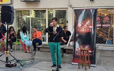 Another 'X-Factor' hopeful trying out in Ashdod (photo credit: Jessica Steinberg/Times of Israel) Another 'X-Factor' hopeful trying out in Ashdod (photo credit: Jessica Steinberg/Times of Israel)
