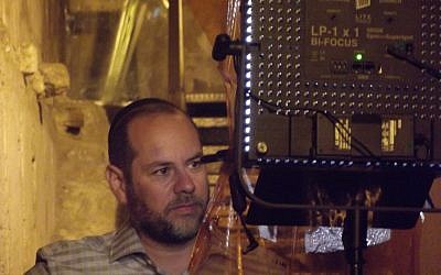 Harry Moskoff filming 'The A.R.K. Report' in the Western Wall tunnels (Courtesy Harry Moskoff)