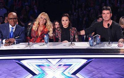 A recent panel of 'X-Factor' judges, including L.A. Reid, Britney Spears, Demi Lovato and Simon Cowell (Courtesy 'The X-Factor Israel' Facebook page) A recent panel of 'X-Factor' judges, including L.A. Reid, Britney Spears, Demi Lovato and Simon Cowell (Courtesy 'The X-Factor Israel' Facebook page)