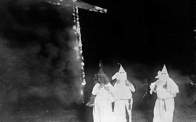 Early Klan cross burning. (photo credit: public domain)