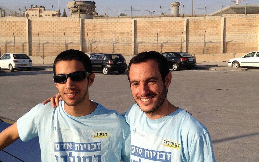 Matan Asher, right, and Alon Begin at the Qalandiya checkpoint, April 30 (photo credit: Elhanan Miller/Times of Israel) Matan Asher, right, and Alon Begin at the Qalandiya checkpoint, April 30 (photo credit: Elhanan Miller/Times of Israel)