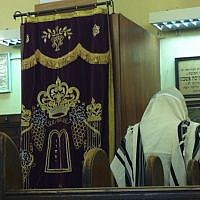 An illustrative photo of a man praying at a synagogue. (photo credit: Aaron Kalman) An illustrative photo of a man praying at a synagogue. (photo credit: Aaron Kalman)