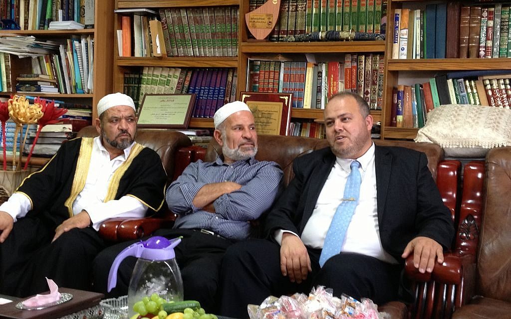 Sheikh Omar Kayal, imam of the Bilal mosque (right), sits with Israeli Muslim clerics at a reception for French Imam Hassen Chalghoumi in Majd Al-Krum, May 29 (photo credit: Elhanan Miller/Times of Israel) Sheikh Omar Kayal, imam of the Bilal mosque (right), sits with Israeli Muslim clerics at a reception for French Imam Hassen Chalghoumi in Majd Al-Krum, May 29 (photo credit: Elhanan Miller/Times of Israel)