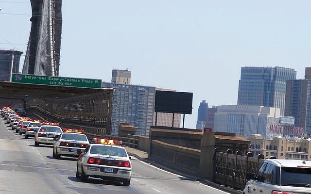 Illustrative photo of police on the Brooklyn Bridge (photo credit: CC BY-SA, Edward M. Johnson, Flickr) Illustrative photo of police on the Brooklyn Bridge (photo credit: CC BY-SA, Edward M. Johnson, Flickr)