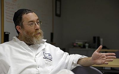 Rabbi Pinchas Herman responds during an interview at Novozymes North America Inc. in Franklinton, N.C., where he routinely inspects machinery used for enzyme production for kosher products. (photo credit: AP Photo/Gerry Broome)