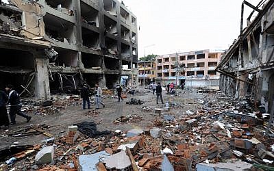 The scene of one of the explosion sites that killed 46 and injured about 50 others, in Reyhanli, near Turkey's border with Syria, Saturday, May 12. (photo credit: AP)