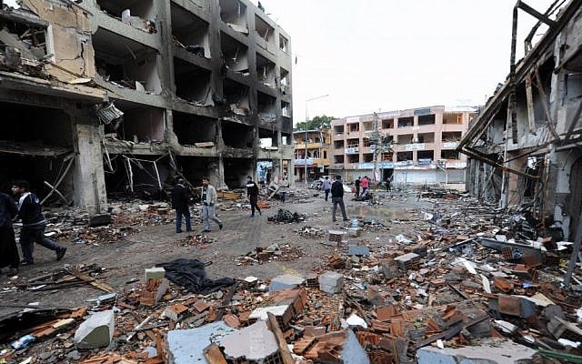 The scene of one of the explosion sites that killed 46 and injured about 50 others, in Reyhanli, near Turkey's border with Syria, Saturday, May 12. (photo credit: AP) The scene of one of the explosion sites that killed 46 and injured about 50 others, in Reyhanli, near Turkey's border with Syria, Saturday, May 12. (photo credit: AP)