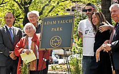 Noel and Frances Yauch, second from left, and former Beastie Boys member Adam Horovitz and wife Rachael, with New York City and Brooklyn officials standing by the plaque marking Adam Yauch Park in Brooklyn, May 3, 2013. (Daniel Zuchnik/Getty/via JTA)