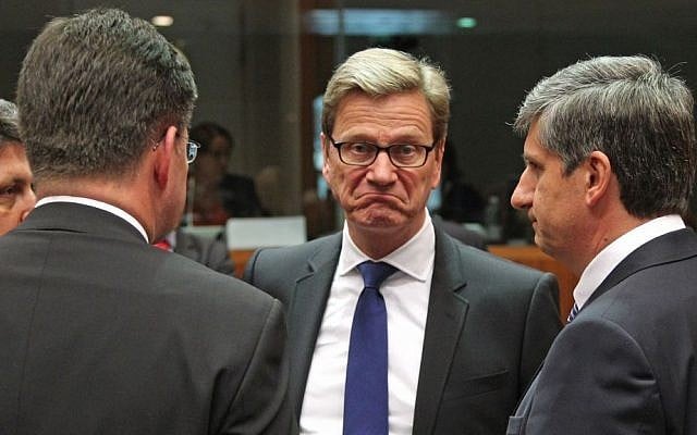 German Foreign Minister Guido Westerwelle, center, listens to Austrian Foreign Minister Michael Spindelegger, right, and other counterparts, during the EU foreign ministers meeting, at the European Council building in Brussels, on Monday, May 27, 2013. (photo credit: AP Photo/Yves Logghe) German Foreign Minister Guido Westerwelle, center, listens to Austrian Foreign Minister Michael Spindelegger, right, and other counterparts, during the EU foreign ministers meeting, at the European Council building in Brussels, on Monday, May 27, 2013. (photo credit: AP Photo/Yves Logghe)