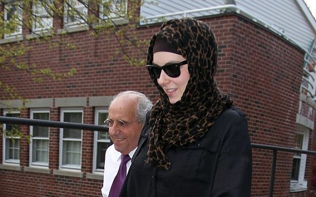 Katherine Russell, wife of Boston Marathon bomber suspect Tamerlan Tsarnaev, leaves the law office of DeLuca and Weizenbaum with Amato DeLuca, left, Monday, April 29, in Providence, R.I. (photo credit: AP/Stew Milne) Katherine Russell, wife of Boston Marathon bomber suspect Tamerlan Tsarnaev, leaves the law office of DeLuca and Weizenbaum with Amato DeLuca, left, Monday, April 29, in Providence, R.I. (photo credit: AP/Stew Milne)