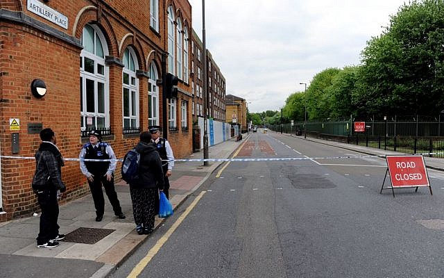 The scene where British officials said one person has died and at least two people have been wounded in an attack on Wednesday May 22, 2013. (photo credit: AP Photo/Nick Ansell/PA) The scene where British officials said one person has died and at least two people have been wounded in an attack on Wednesday May 22, 2013. (photo credit: AP Photo/Nick Ansell/PA)
