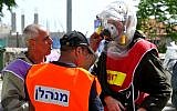 Soldiers practice dealing with a non-conventional attack, Wednesday (photo credit: David Katz/The Israel Project)