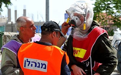 Soldiers practice dealing with a non-conventional attack, Wednesday (photo credit: David Katz/The Israel Project)