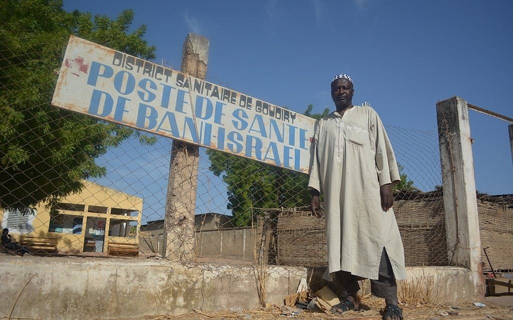 Dougoutigo Fadiga outside the Bani Israel clinic near the Senegalese village's sacred tree, May 2013. (photo credit: Cnaan Liphshiz/JTA) Dougoutigo Fadiga outside the Bani Israel clinic near the Senegalese village's sacred tree, May 2013. (photo credit: Cnaan Liphshiz/JTA)