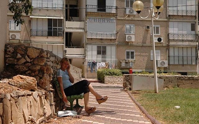 A woman sits outside an underground bomb shelter in Nahariya. (photo credit: Yossi Zamir/Flash90/File) A woman sits outside an underground bomb shelter in Nahariya. (photo credit: Yossi Zamir/Flash90/File)