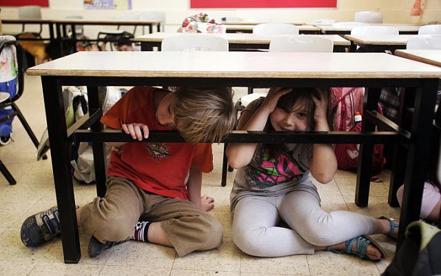 Children in a school in Tel Aviv during a home front exercise, in the school's safe bunker, May 26 2010 (photo credit: Uri Lenz/Flash90) Children in a school in Tel Aviv during a home front exercise, in the school's safe bunker, May 26 2010 (photo credit: Uri Lenz/Flash90)