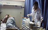 Illustrative photo of a man receiving medical treatment at a Palestinian hospital in Ramallah, March 17, 2011. (Issam Rimawi/Flash90)