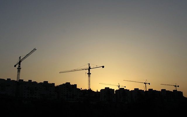 Cranes building new apartment buildings in Beit Shemesh, in 2011. (photo credit: Nati Shohat/Flash90) Cranes building new apartment buildings in Beit Shemesh, in 2011. (photo credit: Nati Shohat/Flash90)