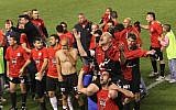 Israel's first fan-owned team, Hapoel Katamon, celebrating a win (photo credit: Yossi Zamir/Flash 90)