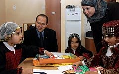 Outgoing Jerusalem Mayor Nir Barkat visits Arab students in a newly opened elementary school in the Arab neighborhood of Umm Tuba, in East Jerusalem, on December 13, 2011. (photo credit: Kobi Gideon/Flash90)