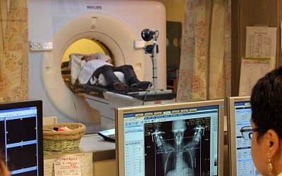 A woman with breast cancer receives a CT scan (Chen Leopold/FLASH90)