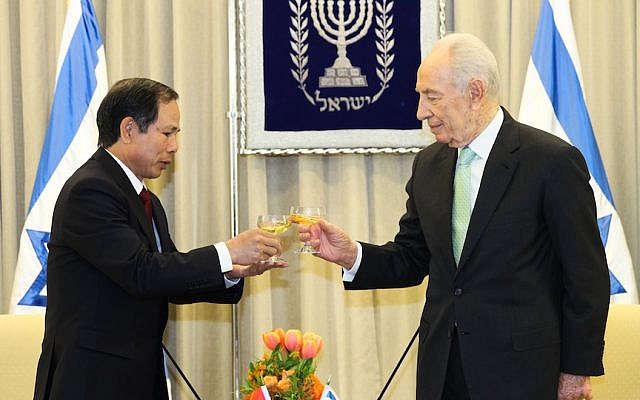 The new ambassador to Israel from Vietnam, Mr. Ta Duy Chinh, is welcomed by Israeli president Shimon Peres at the President's house in Jerusalem at a ceremony on February 28 2013 (Photo credit: Issac Harari/ FLASH90) The new ambassador to Israel from Vietnam, Mr. Ta Duy Chinh, is welcomed by Israeli president Shimon Peres at the President's house in Jerusalem at a ceremony on February 28 2013 (Photo credit: Issac Harari/ FLASH90)
