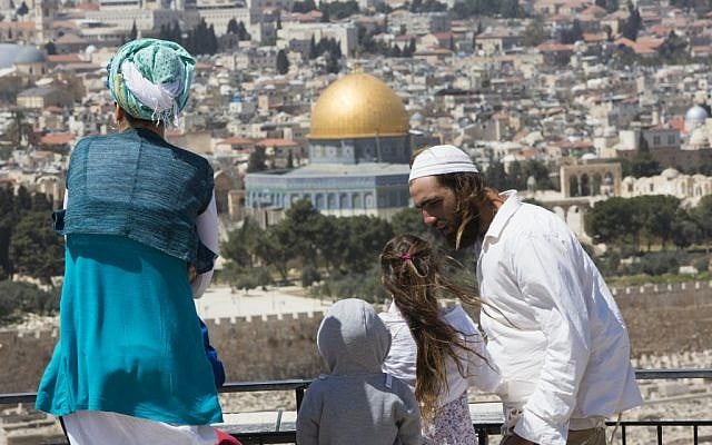 A Jewish family looks out over the Temple Mount, March 2013. (photo credit: Yonatan Sindel/Flash90)