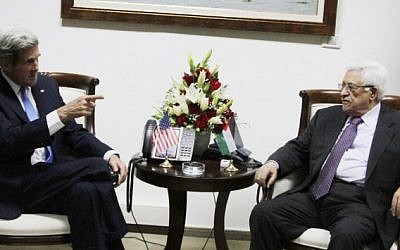 US Secretary of State John Kerry (L) with Palestinian Authority President Mahmoud Abbas in the West Bank city of Ramallah, April 7, 2013 (photo credit: Issam Rimawi/Flash90)