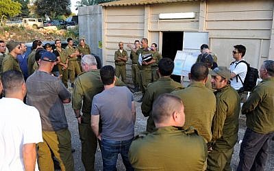 IDF reserve soldiers take part in a surprise drill in an army base in northern Israel, Tuesday (photo credit: Shay Wagner/Israel Army Spokesman/Flash90)