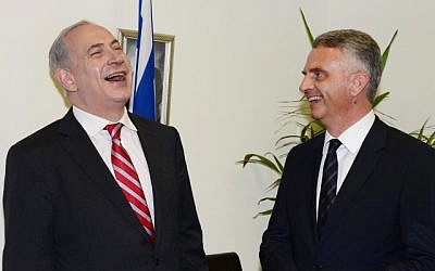 Prime Minister Benjamin Netanyahu (left) meets with Swiss Foreign Minister Didier Burkhalter at the premier's Tel Aviv office on Thursday. (photo credit: Moshe Milner/GPO/Flash90)