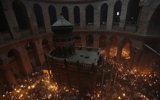 Orthodox Christian worshipers celebrate Easter at the Church of the Holy Sepulchre in Jerusalem's Old City during on May 4, 2013. (photo credit: Sliman Khader/Flash90). Orthodox Christian worshipers celebrate Easter at the Church of the Holy Sepulchre in Jerusalem's Old City during on May 4, 2013. (photo credit: Sliman Khader/Flash90).